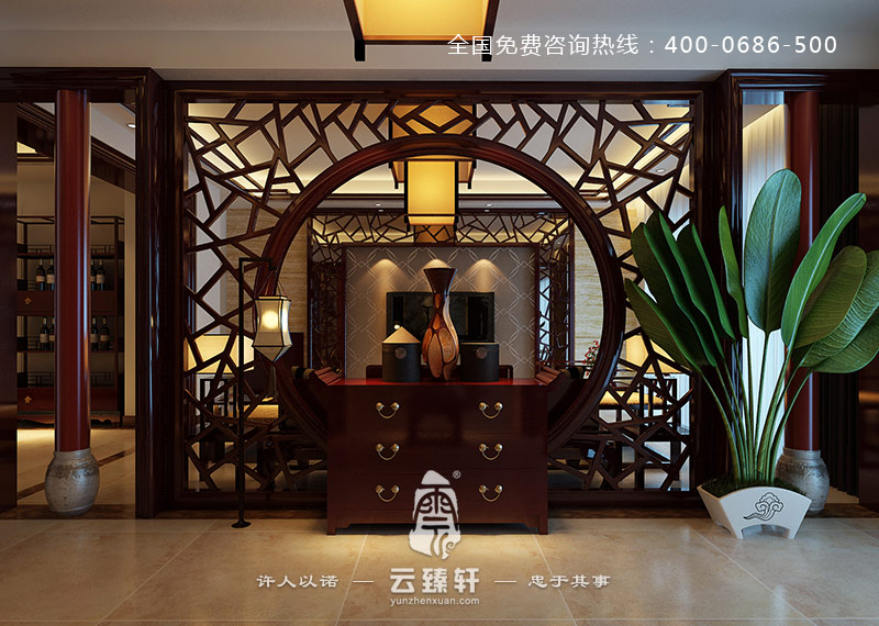 圓形的月洞門巧妙的作為中式玄關(guān)的背景墻